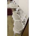 A five piece white painted metal alloy garden suite comprising two benches, length 137cm, pair of