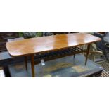 A 1960's teak coffee table, width 137cm