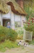 Arthur Claude Strachan, (Scottish, 1865-1938), watercolour, 'At Evesham', puppies beside a cottage,