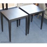 A pair of ebonised lamp tables, 45 cm wide, 55 cm highProvenance - a country estate near Rye,