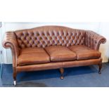 A George III style buttoned tan leather camel back sofa, 210 cm wideProvenance - a country estate