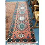 A Persian wool runner, 335 x 93cm