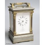 A silvered and gilt brass Corinthian pattern carriage clock, height 17cm