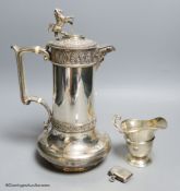 A Victorian Elkington & Co silver plated hot water jug, 27.7cm, an Edwardian silver cream jug and