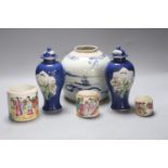 A Chinese jar, a pair of vases and three graduated brush pots, Qing period or later, tallest 18cm