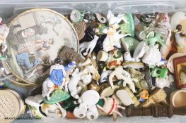 A collection of miniature ceramic and glass figures and animals, treen, enamel patch boxes,