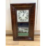 An American wall clock, by Jerome & Co, height 66cm