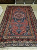 A Caucasian design red ground Kelim rug, 280 x 174cm