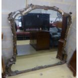 A Victorian carved and giltwoodovermantel mirror (a.f), width 152cm