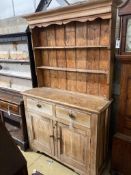 A Victorian pale pine kitchen dresser, length 124cm, depth 43cm, height 204cm