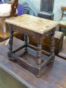 A 17th century style oak joint stool