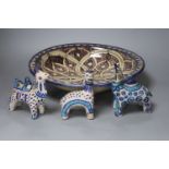 A Moroccan pottery dish, diameter 36cm, and three fritware animal figures