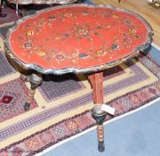 A 19th century Swiss painted folding table, 75 cm long, 56 cm deep, 62 cm pine, the underside with