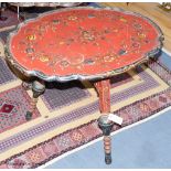 A 19th century Swiss painted folding table, 75 cm long, 56 cm deep, 62 cm pine, the underside with