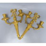 A pair of Louis XVI style ormolu two branch wall lights, height 39cm