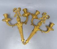 A pair of Louis XVI style ormolu two branch wall lights, height 39cm