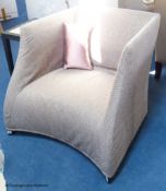 A contemporary upholstered armchairProvenance - a country estate near Rye, Sussex