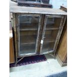 An Edwardian bamboo and cane bookcase, width 91cm