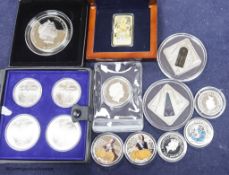 A group of silver proof coins, to include a JVP boxed orthodox shines $2, a Masterpieces of Art