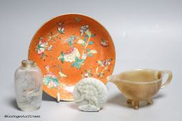 A Chinese jadeite roundel, an agate sauceboat, an inside painted snuff bottle and a ceramic