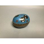A Chinese cloisonne enamel egg shaped box and cover, early 20th century, 12.3cmdecorated with black