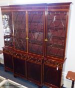 A 19th century and later satinwood banded mahogany breakfront bookcase, 241.5 cm high,
