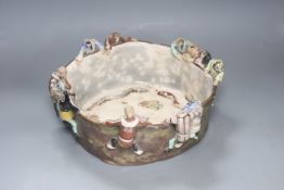 An unusual Japanese Sumida style pottery bowl, figures with detaching heads, diameter 32cm