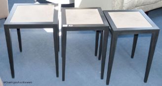 A pair of ebonised ash and parchment topped lamp tables, each 40 cm wide, 60 cm high, and a similar