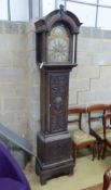 John Badely of Tong. A George III carved oak eight day longcase clock, height 228cm