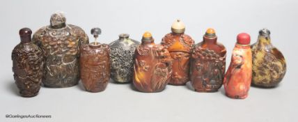 A collection of Chinese horn, tortoiseshell and coral etc. snuff bottles