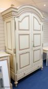 A cream and parcel gilt 'eclectic' wardrobe by And So To Bed, 140 cm wide, 227 cm high, 61 cm