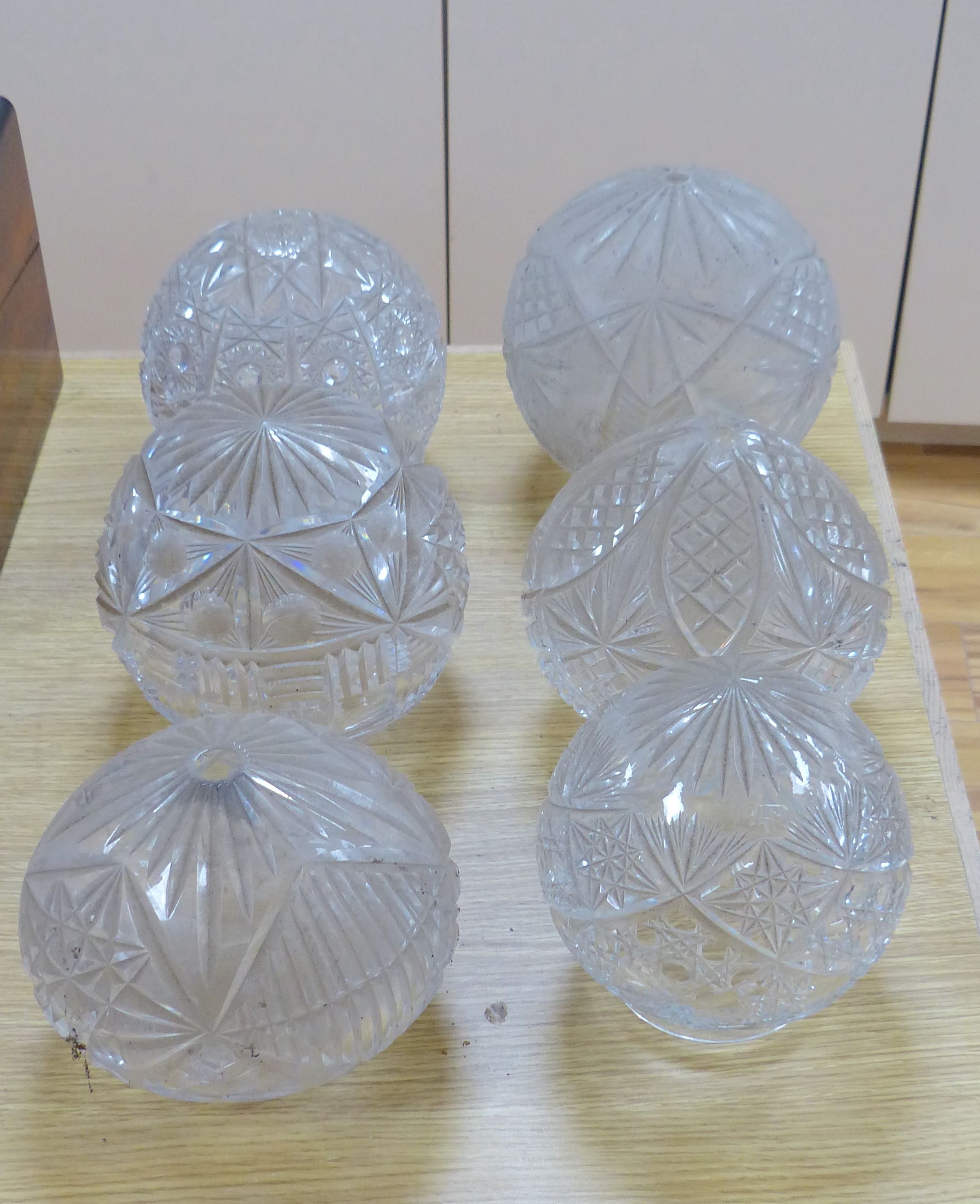 A collection of circular cut glass table lamp shades (6)