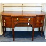A George III mahogany bow-breakront sideboard, 152cm long, 116.5 cm high to top brass rail, 76 cm