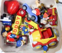 A collection of Noddy and Mickey Mouse toys