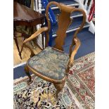 A Queen Anne revival walnut elbow chair