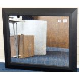 A contemporary distressed mirror, 91.5 cm wide, 76.5 cm highProvenance - a country estate near Rye,