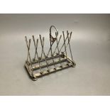 A novelty golfing silver plated toast rack