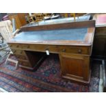 A late Victorian mahogany pedestal desk, length 152cm