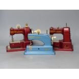 Three vintage Vulcan hand sewing machines
