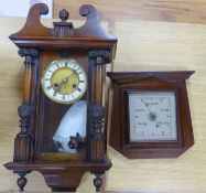 A 19th century German walnut wall clock with pendulum and key, height 58cm, and a mahogany