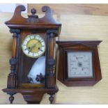 A 19th century German walnut wall clock with pendulum and key, height 58cm, and a mahogany