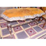 A Victorian figured walnut centre table, 104.5 cm long, 77 cm deep, 68.5 cm high