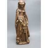 A large painted plaster statue of St Martha, height 70cm