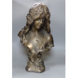 An Art Nouveau style composition bust of a girl, height 60cm