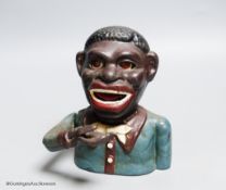 A cast iron figural money box