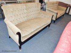 A pair of George IV style mahogany button back sofas, 181 cm wideProvenance - a country estate near