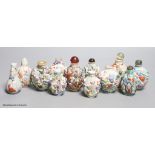 A collection of Chinese twelve famille rose snuff bottles