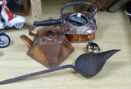 Two copper kettles, a beer slipper, iron ladle and a bull's eye lens