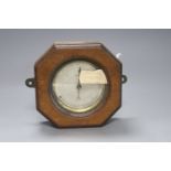 An Edwardian oak cased travelling aneroid barometer, height 19cm