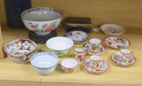 A collection of Chinese and Japanese ceramics,including a famille rose Export bowl on hardwood